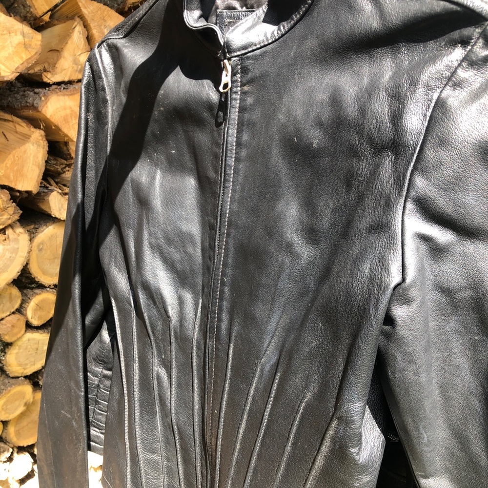 Woman black leather jacket